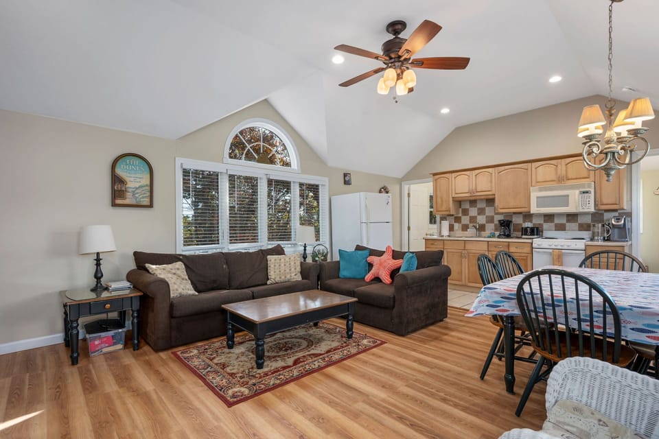 Open concept with living room, dining area and kitchen