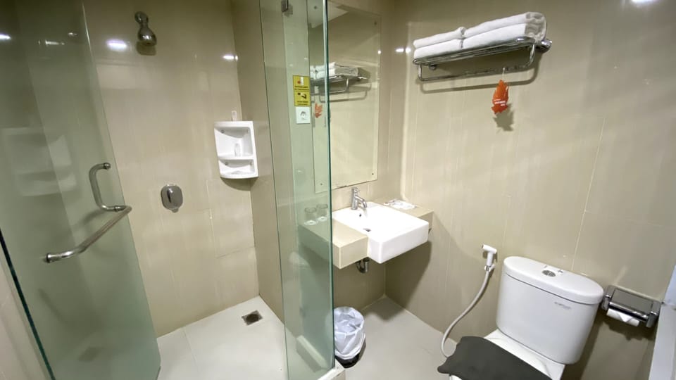 Shower, free toiletries, hair dryer, slippers