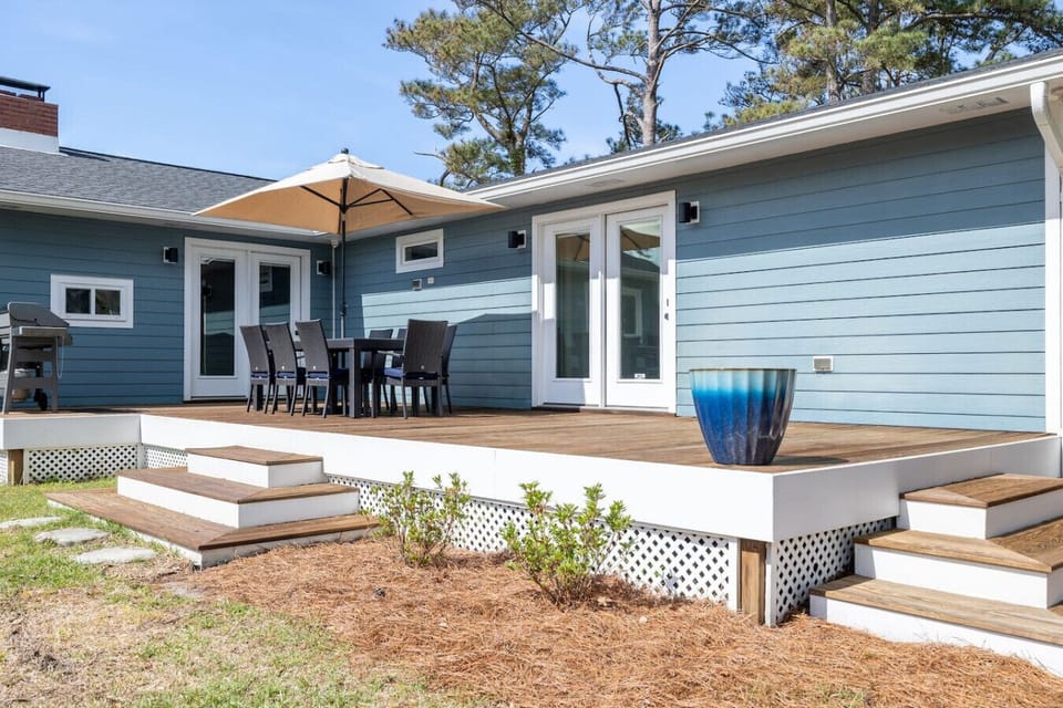 Fully fenced in backyard and a patio designed for entertaining