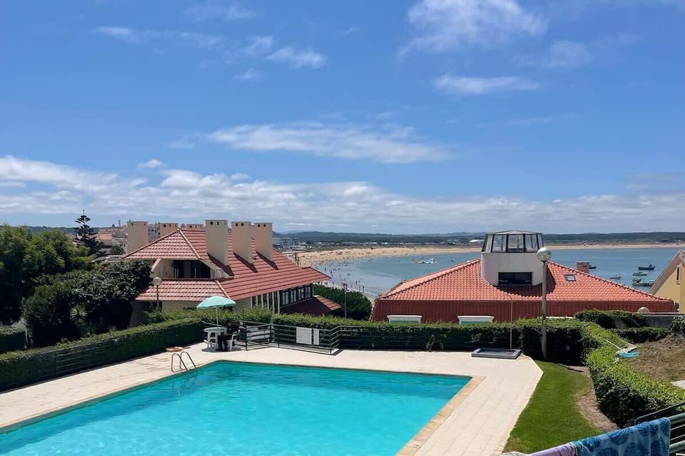 POOL AREA AND VIEWS OF THE BEACH FROM THE PRIVATE TERRACE