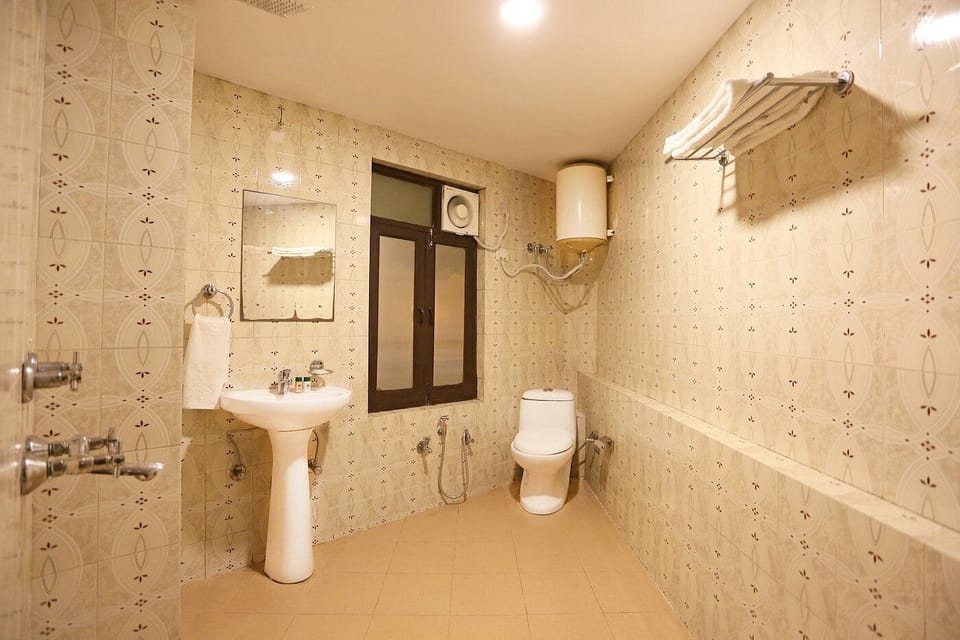 Shower, bathrobes, towels, soap