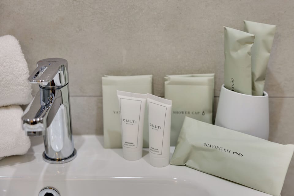 Shower, free toiletries, hair dryer, slippers