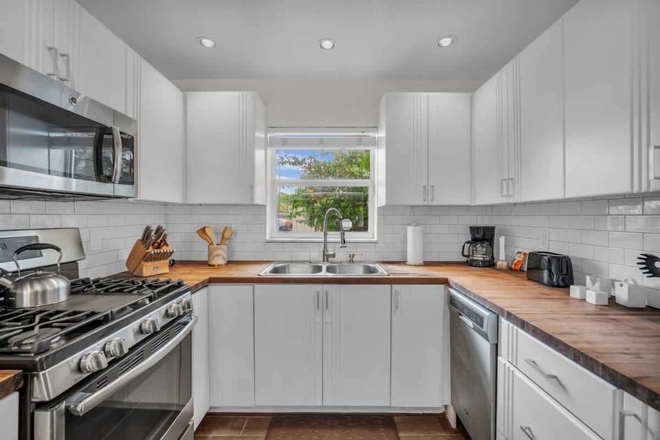 Enjoy effortless cooking in this bright, modern kitchen—fully equipped with everything you need for a seamless stay.