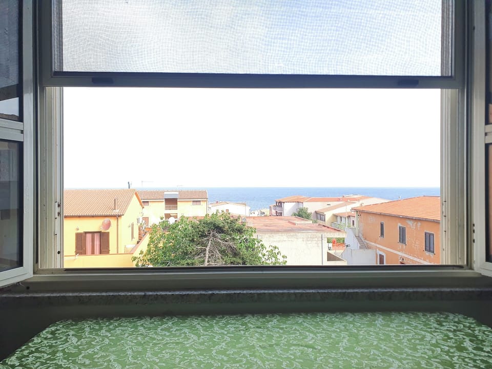 Standard Studio, Patio, Partial Sea View | Living area | Flat-screen TV