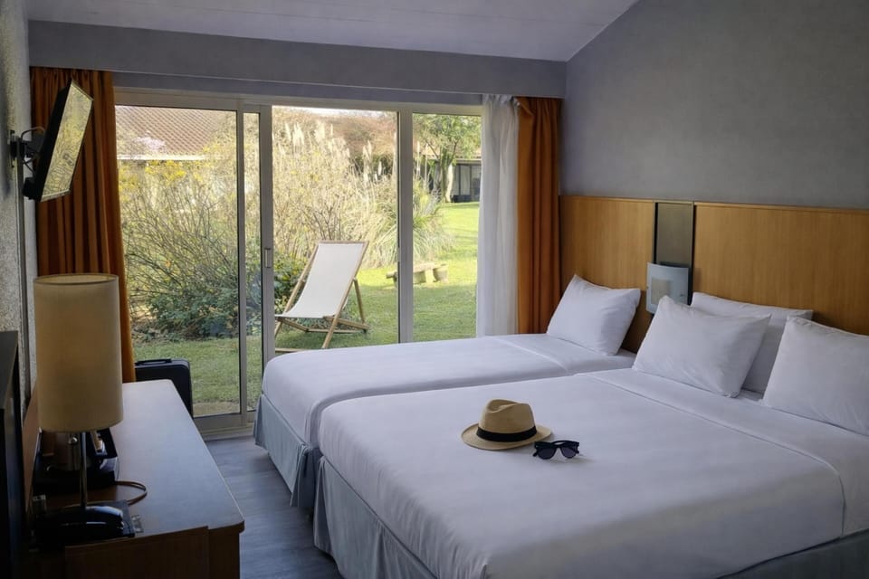 Standard Room, Multiple Beds | Premium bedding, desk, blackout drapes, soundproofing