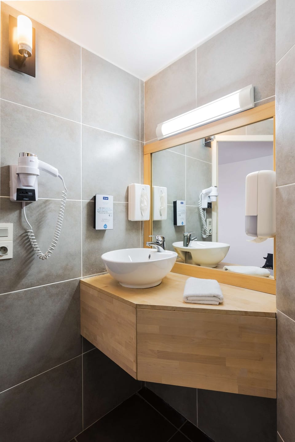 Eco-friendly toiletries, hair dryer, towels