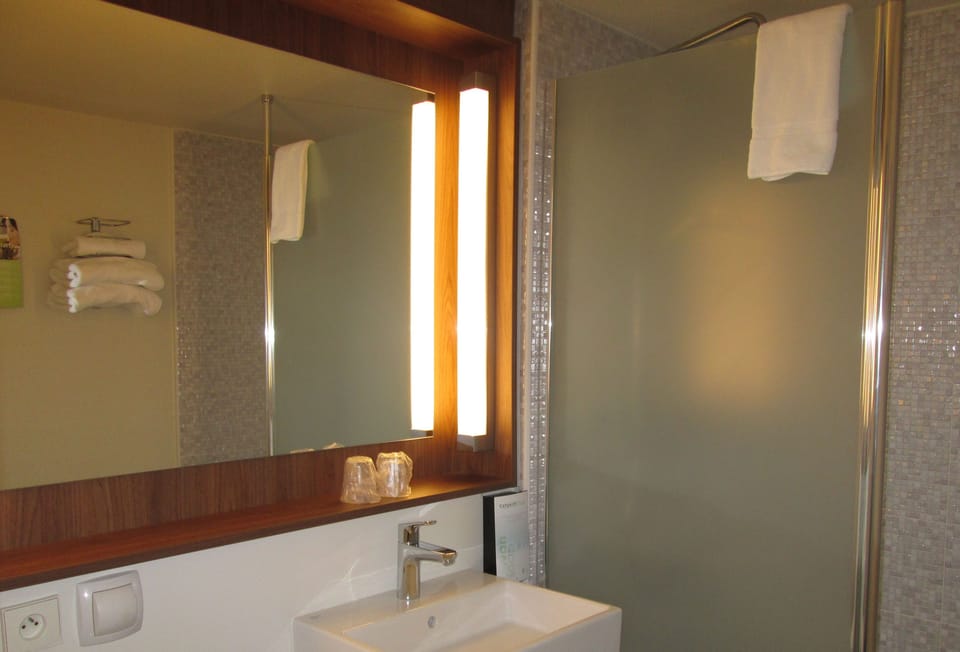 Eco-friendly toiletries, hair dryer, towels