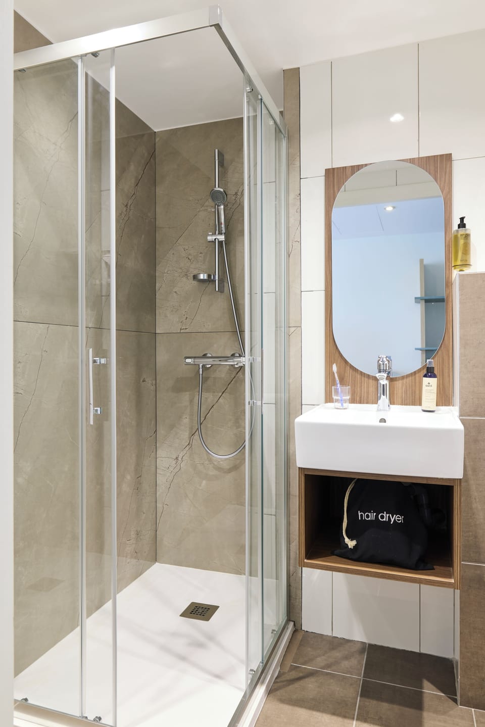Shower, eco-friendly toiletries, hair dryer, towels