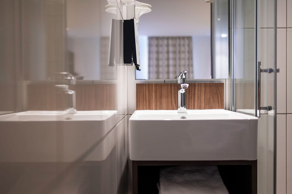 Comfort Room | Bathroom | Shower, eco-friendly toiletries, hair dryer, towels