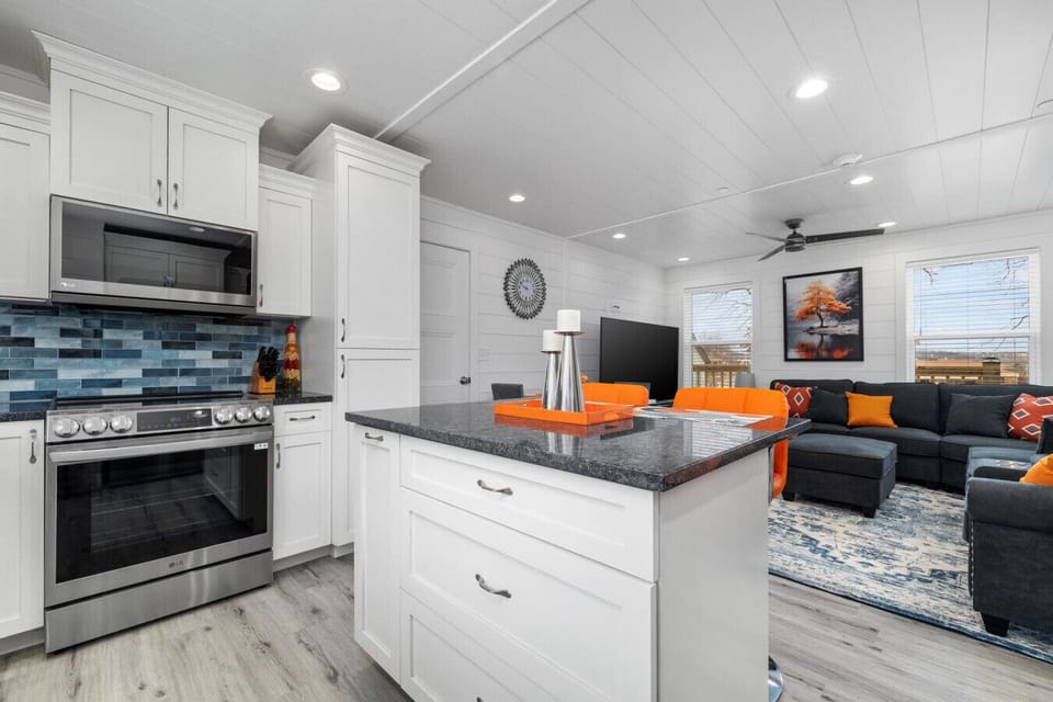 Gather, cook, and connect with countertop seating and an open-concept kitchen