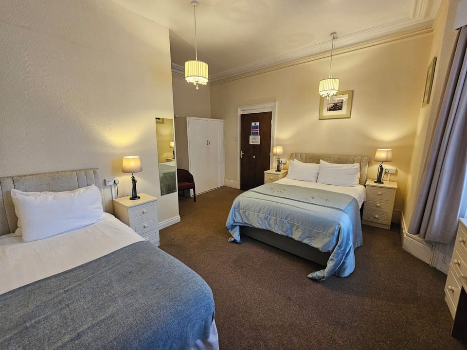 Family Room | Iron/ironing board, bed sheets