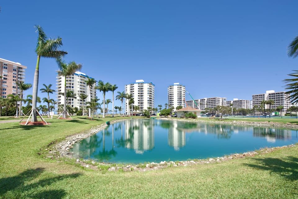 Serene resort grounds with a pond