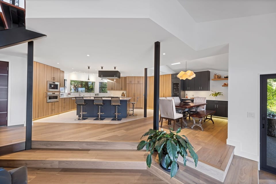 Gather and feast in this light-filled kitchen and dining space, where thoughtful design and comfort come together beautifully.