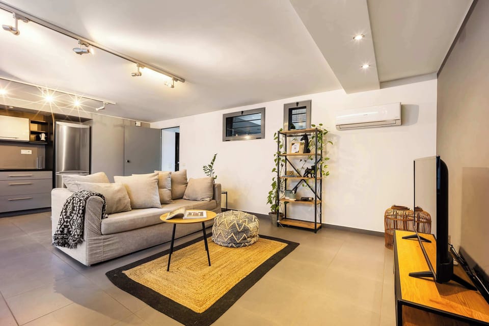 Inviting living space with smart TV and strong internet for seamless streaming and downtime.