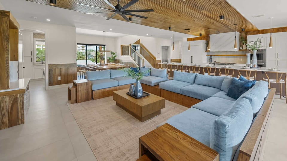 Great Room - Open Floor Plan - Fully Stocked Kitchen, Dining for 14 and Bar seating for 8 - Balcony Access