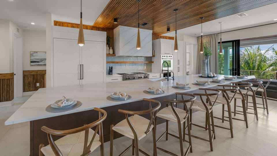 Kitchen - Oversized Refrigerator - (2) Dishwashers, Double Ovens; Large Gas Stove - Balcony Access