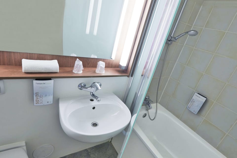 Eco-friendly toiletries, hair dryer, towels, soap