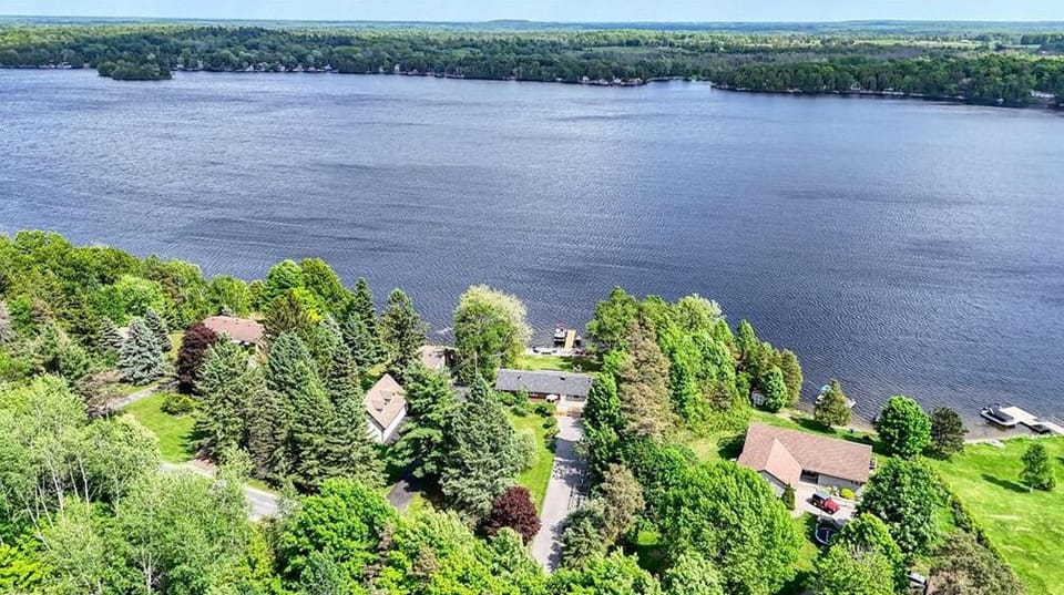 Full top view of lake and cottage (1)