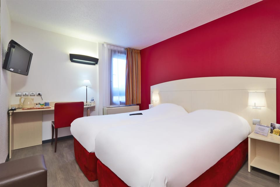 Premium bedding, individually furnished, desk, laptop workspace