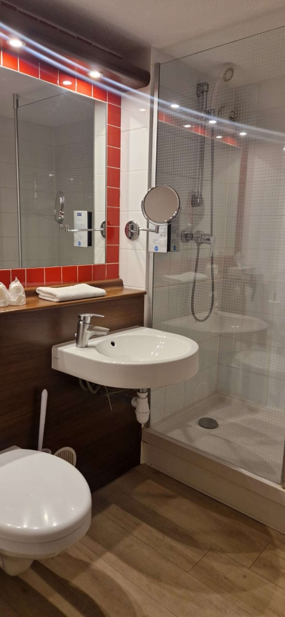 Shower, eco-friendly toiletries, hair dryer, towels