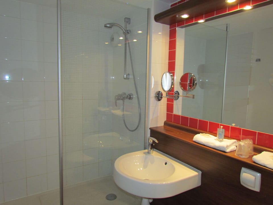 Shower, eco-friendly toiletries, hair dryer, towels