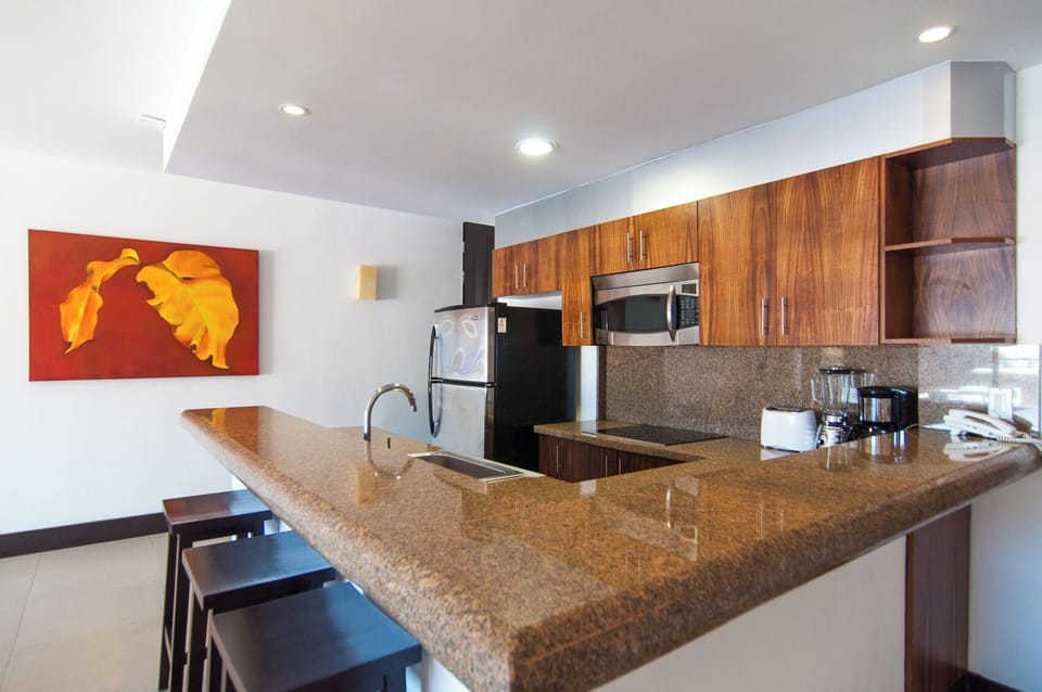 Apartment, 2 Bedrooms, Private Pool, Beachfront | Private kitchen | Full-size fridge, microwave, oven, stovetop