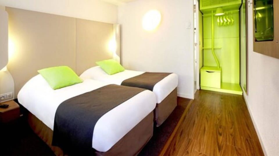 Twin Room | Premium bedding, desk, blackout drapes, iron/ironing board