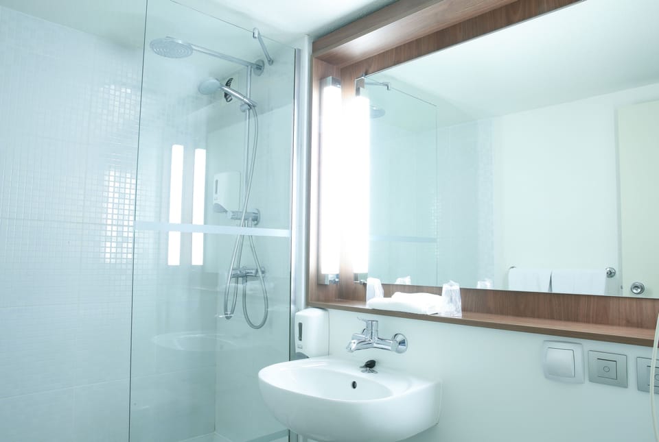 Premium bedding, desk, blackout drapes, iron/ironing board