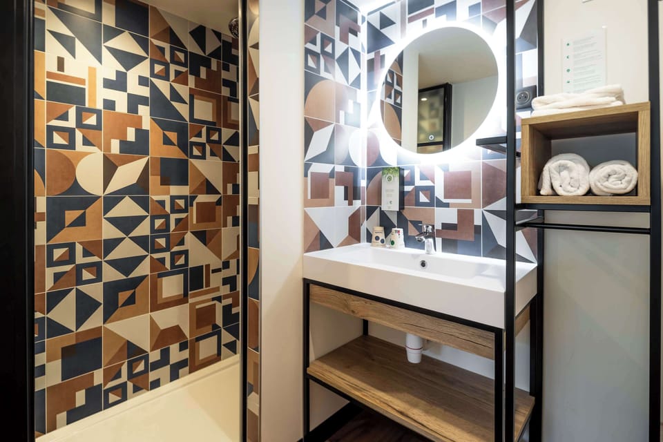 Shower, rainfall showerhead, eco-friendly toiletries, hair dryer