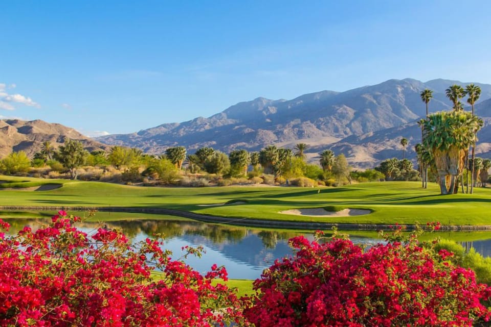 Enjoy Palm Springs desert beauty with vibrant flowers, lush greenery, and mountain views—perfect for nature lovers and golfers alike.