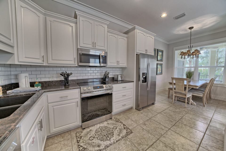 Stainless appliances and charming finishes make cooking feel like a treat
