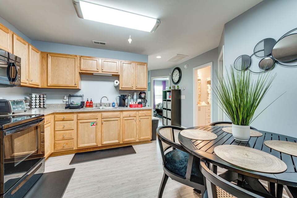 Dining Room | Single-Story Apartment on Upper Floor | Dishware & Flatware