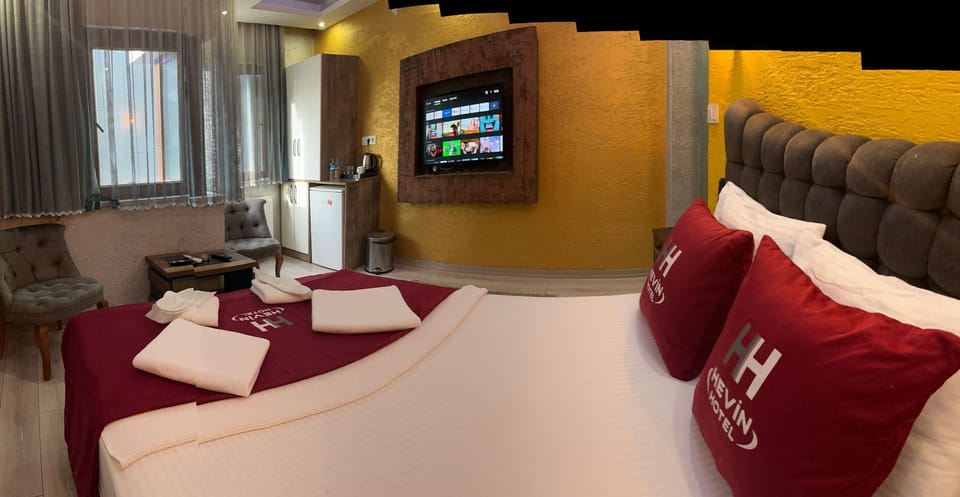 Premium bedding, minibar, laptop workspace, soundproofing