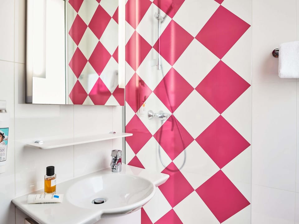 Shower, eco-friendly toiletries, hair dryer, towels