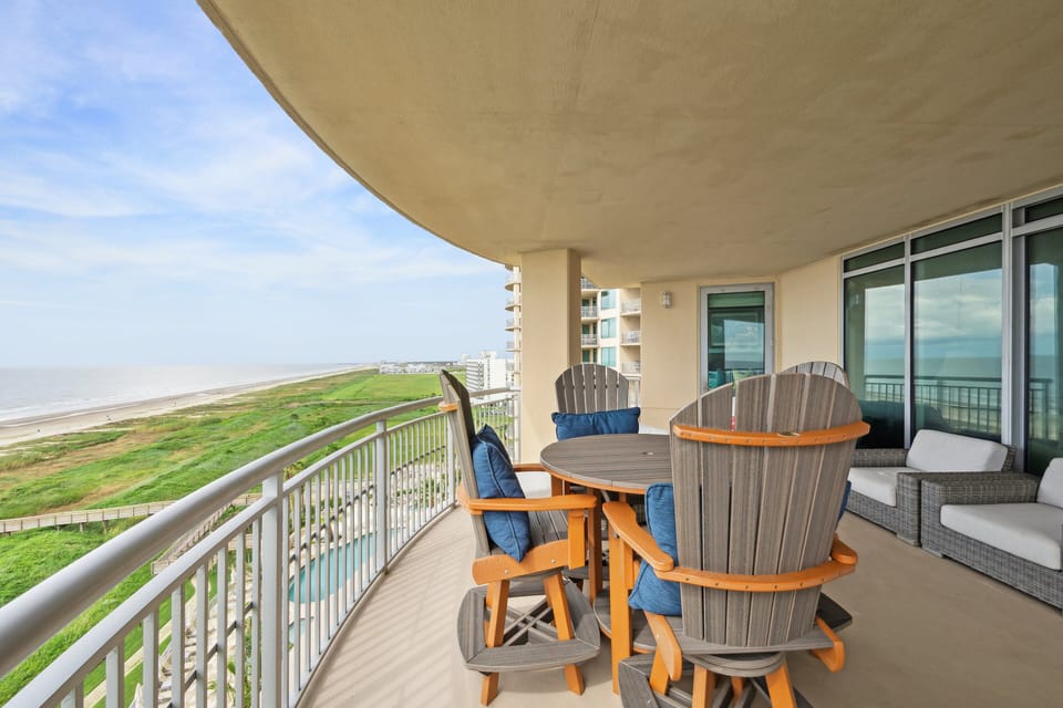 Wraparound balcony with unobstructed views of the beach and pool—ideal for enjoying sunrise coffee or sunset cocktails.