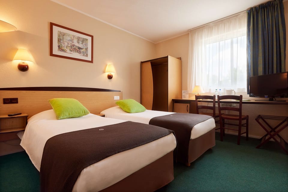 Desk, blackout drapes, iron/ironing board, free WiFi