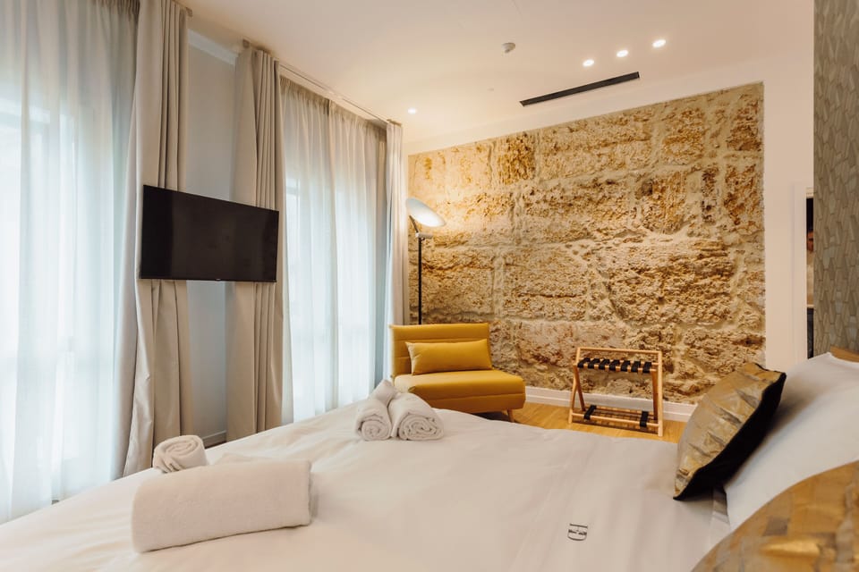 Deluxe Triple Room, City View | Premium bedding, memory foam beds, free minibar, in-room safe