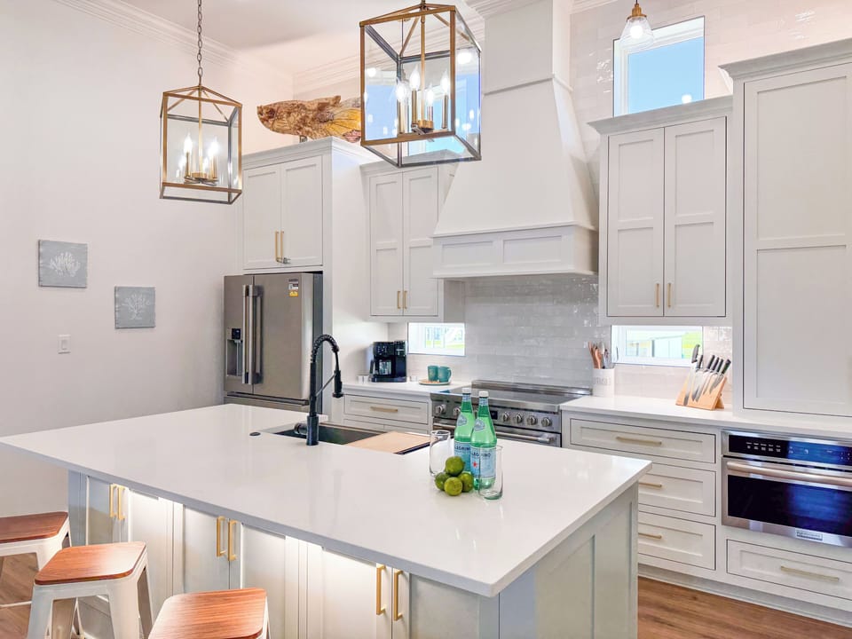 Whip up your favorite meals in this fully equipped gourmet kitchen with stainless steel appliances.