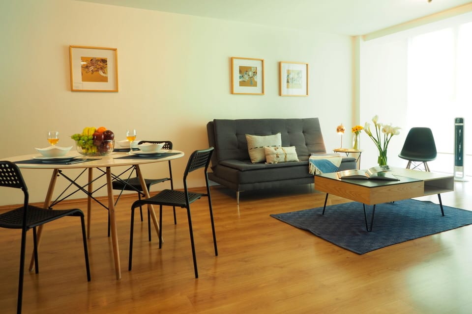 Deluxe Apartment, 2 Bedrooms, Kitchenette, City View | Living area | Smart TV, streaming services