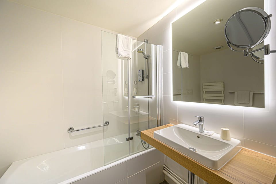 Eco-friendly toiletries, hair dryer, towels, shampoo