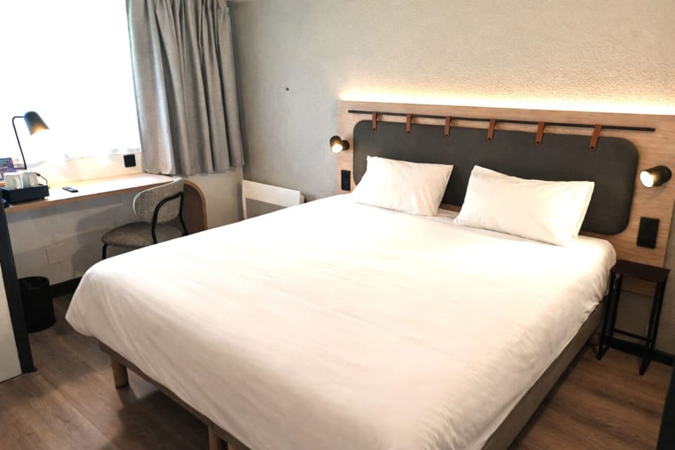 Premium bedding, down comforters, desk, blackout drapes