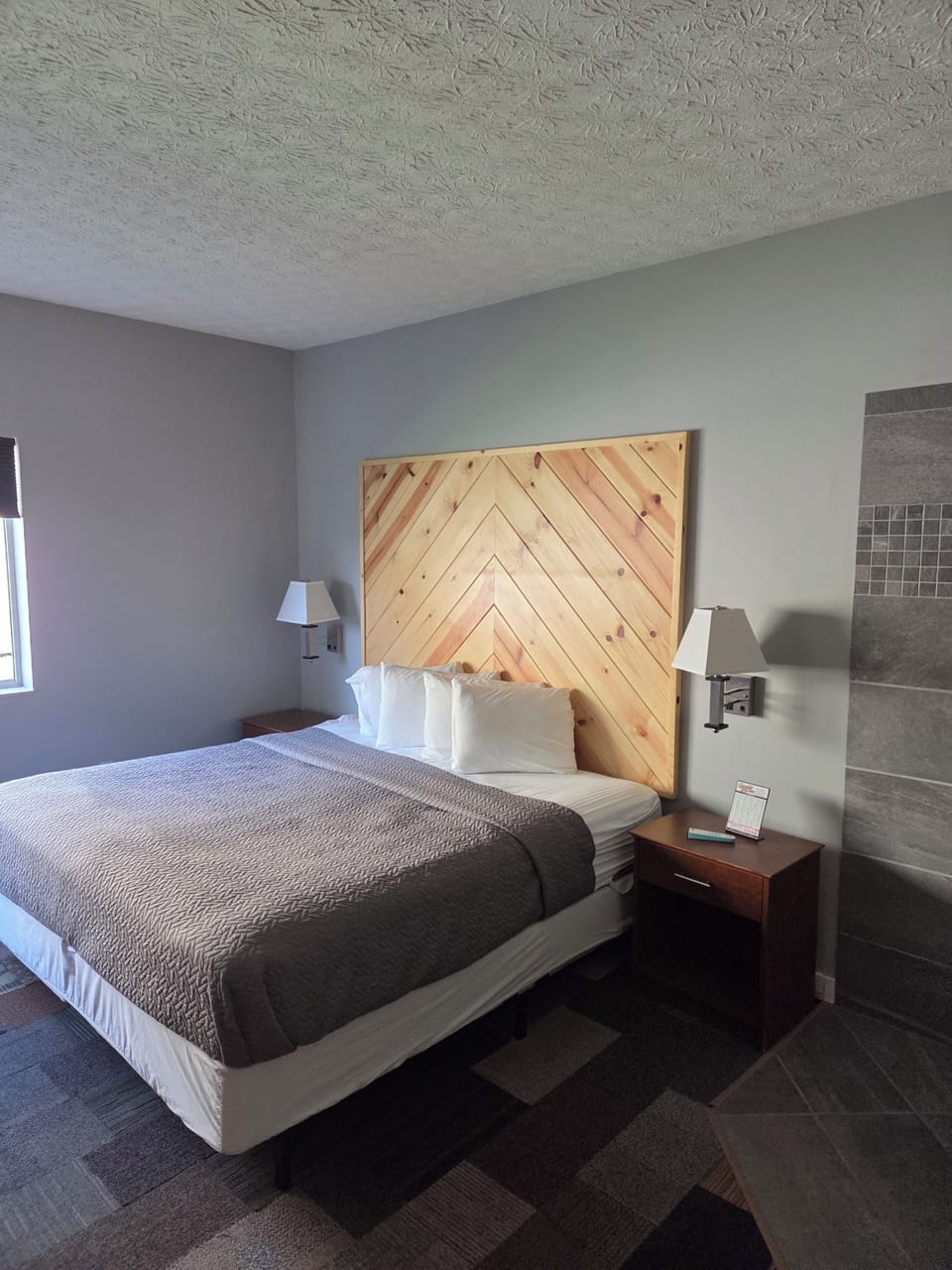 Room, 1 King Bed, Jetted Tub | In-room safe, iron/ironing board, free WiFi, bed sheets