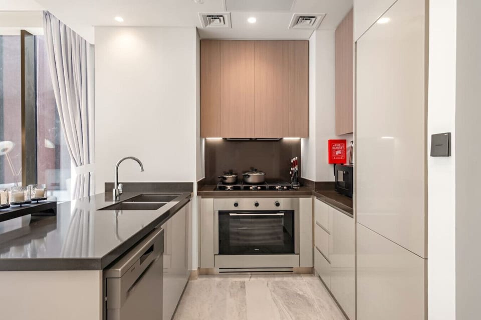 Modern Kitchen: Whip up gourmet meals in this sleek, stylish space with state-of-the-art appliances!