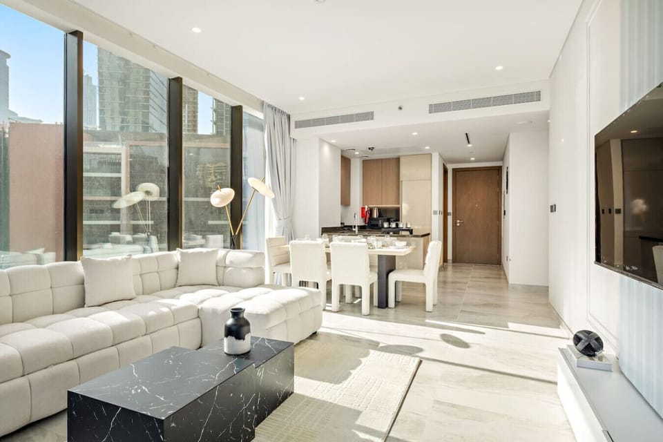 Living Room: Bright and airy ambiance with plush seating and modern decor to unwind in style!