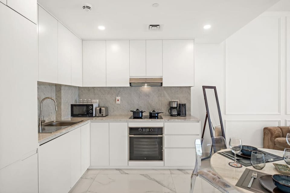 Gourmet Kitchen: Whip up a feast in this sleek, modern kitchen with top-notch appliances!