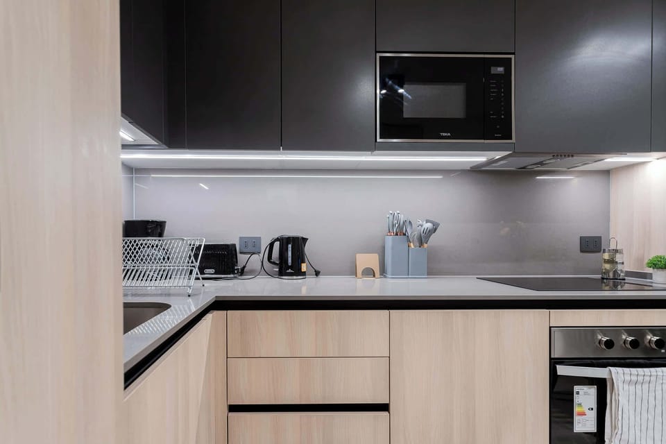Sleek, modern kitchen with top-notch appliances and ample counter space for your culinary adventures.