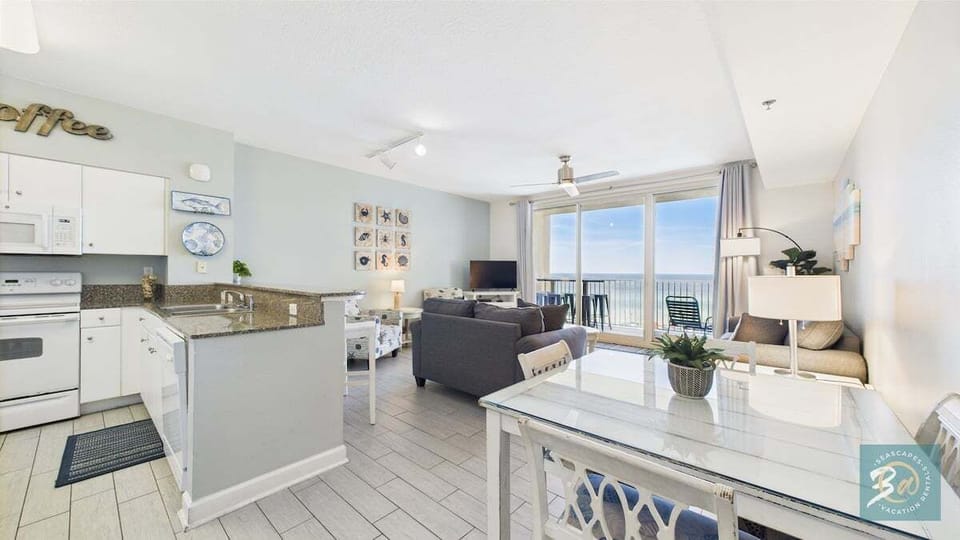 Living area with kitchen and dining area
