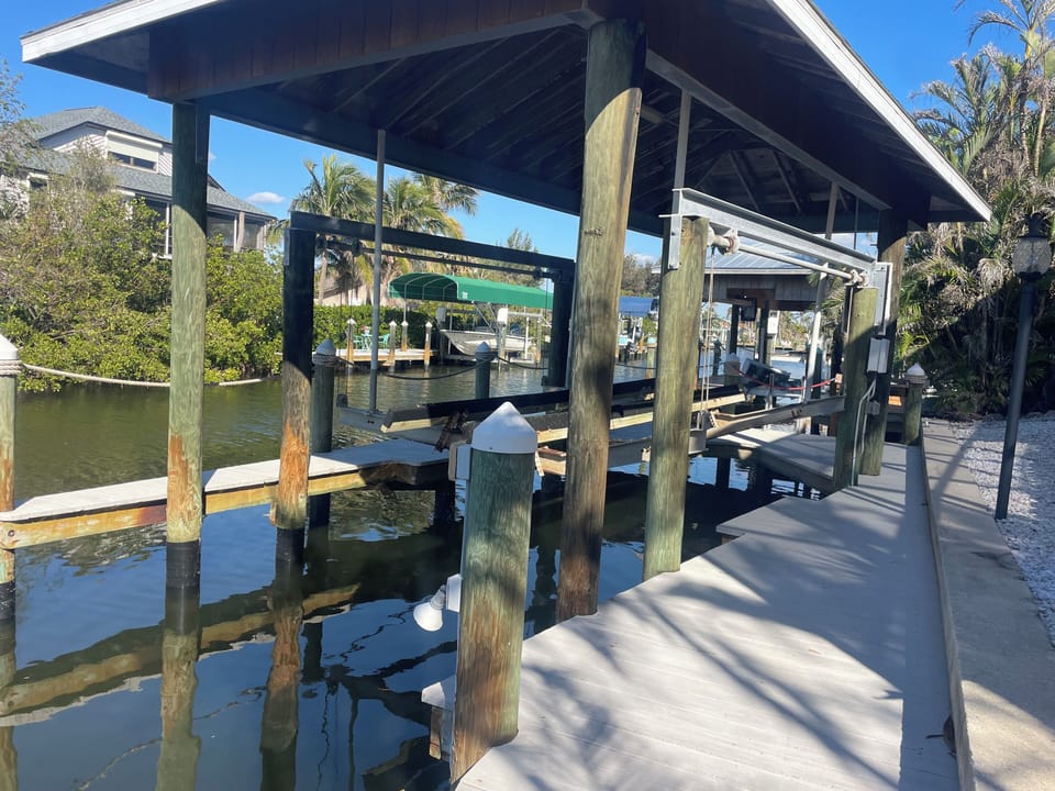 Covered lift - Covered lift for keeping your boat or a rental boat at during your stay.