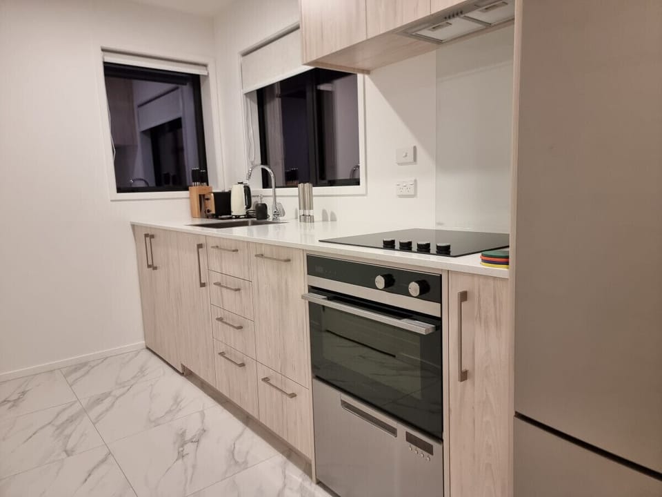 Full Kitchen with fridge, dishwasher, oven, stove