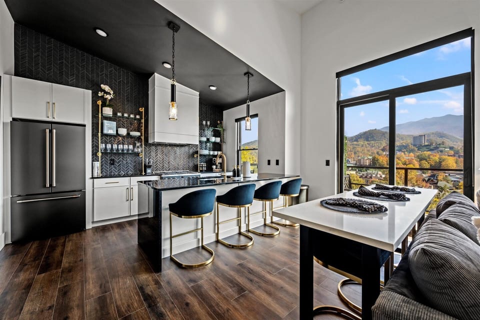 Spacious Living Room offers a cozy yet open area to relax, gather, and unwind. With plush seating, a smart TV, and warm ambiance, it’s perfect for movie nights or spending quality time with family and friends.